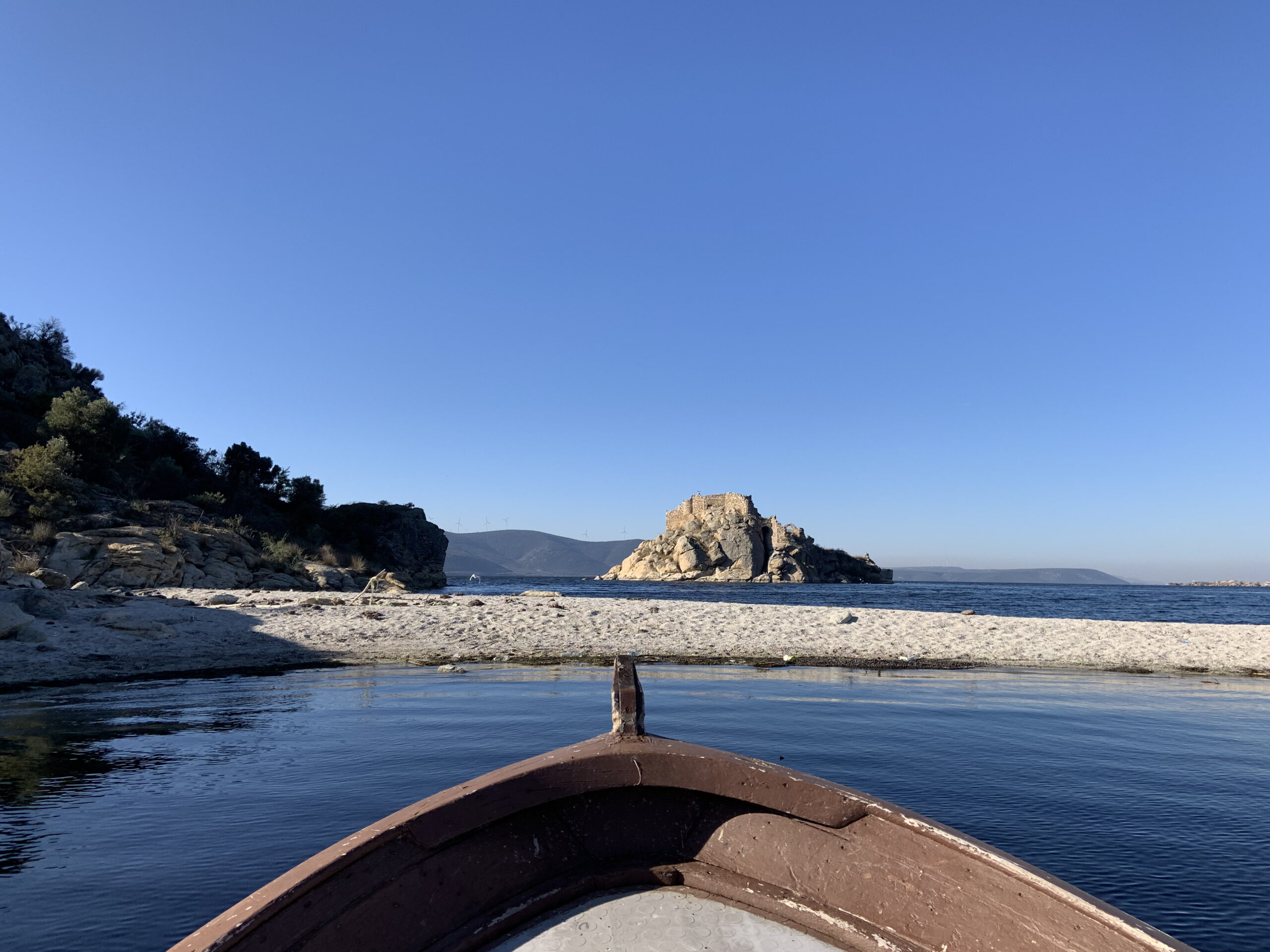 In the background an island with ruins of a monastery