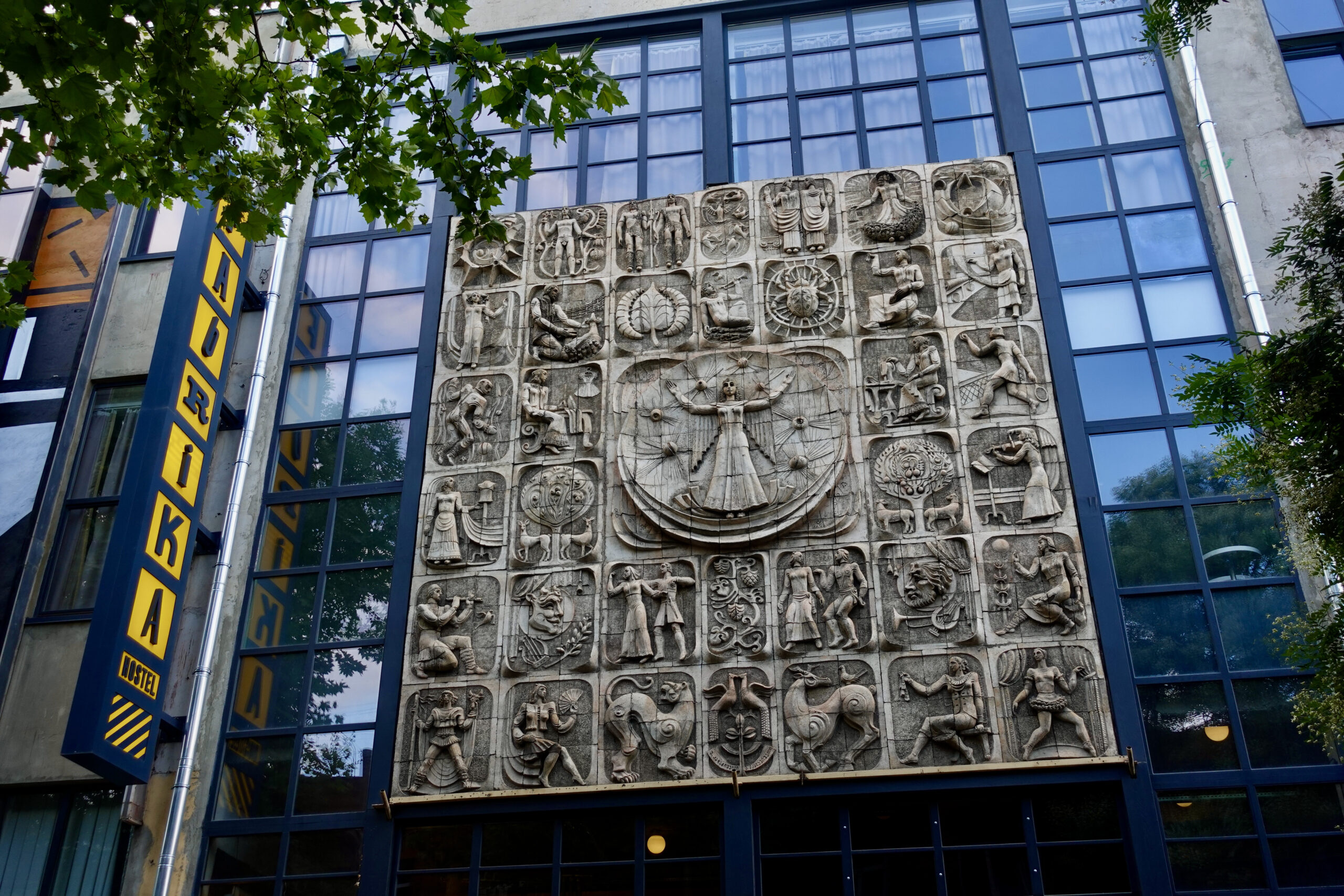 Stone mural at the entrance of Fabrika