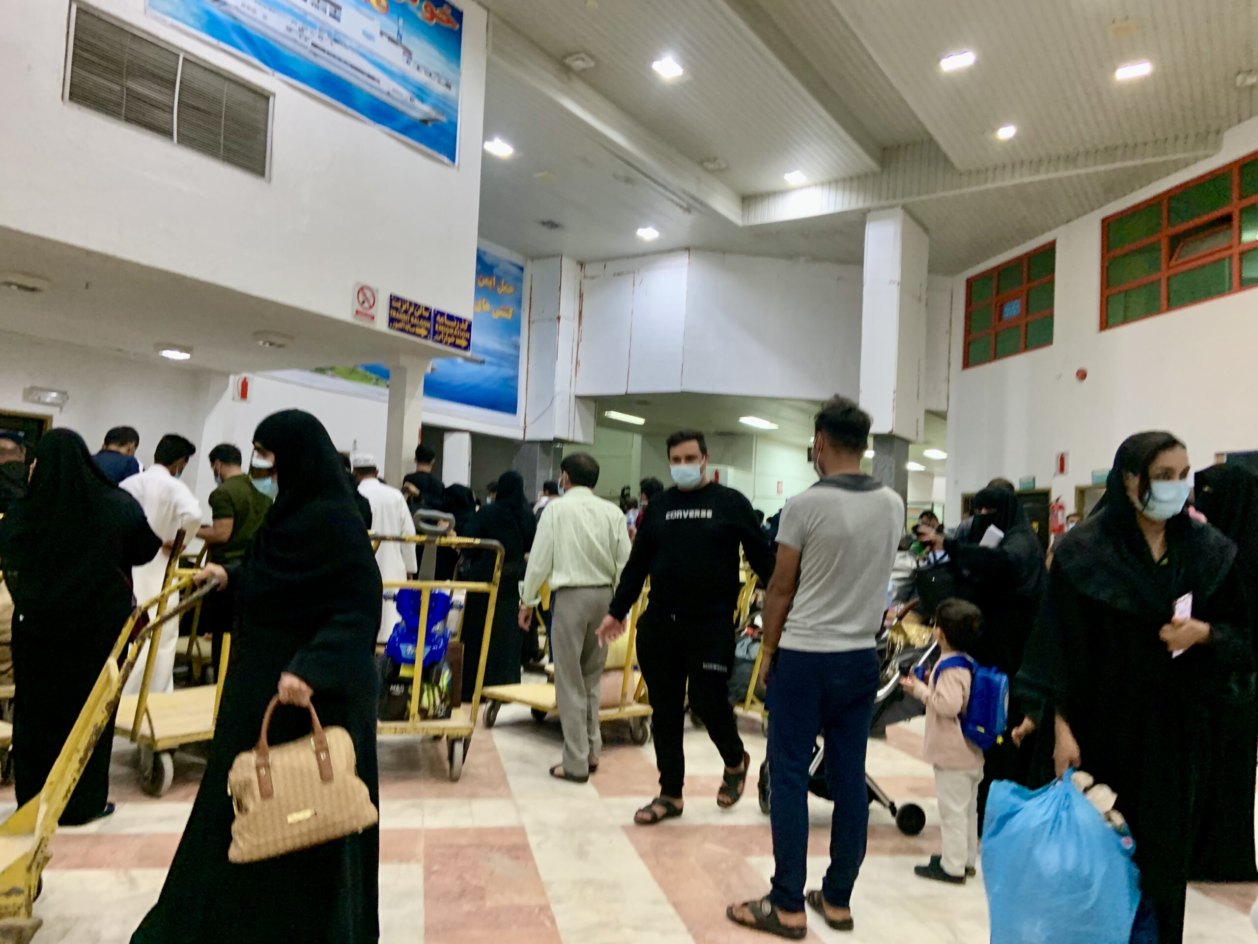 Chaos at our arrival at the ferry port in Bandar Lengeh