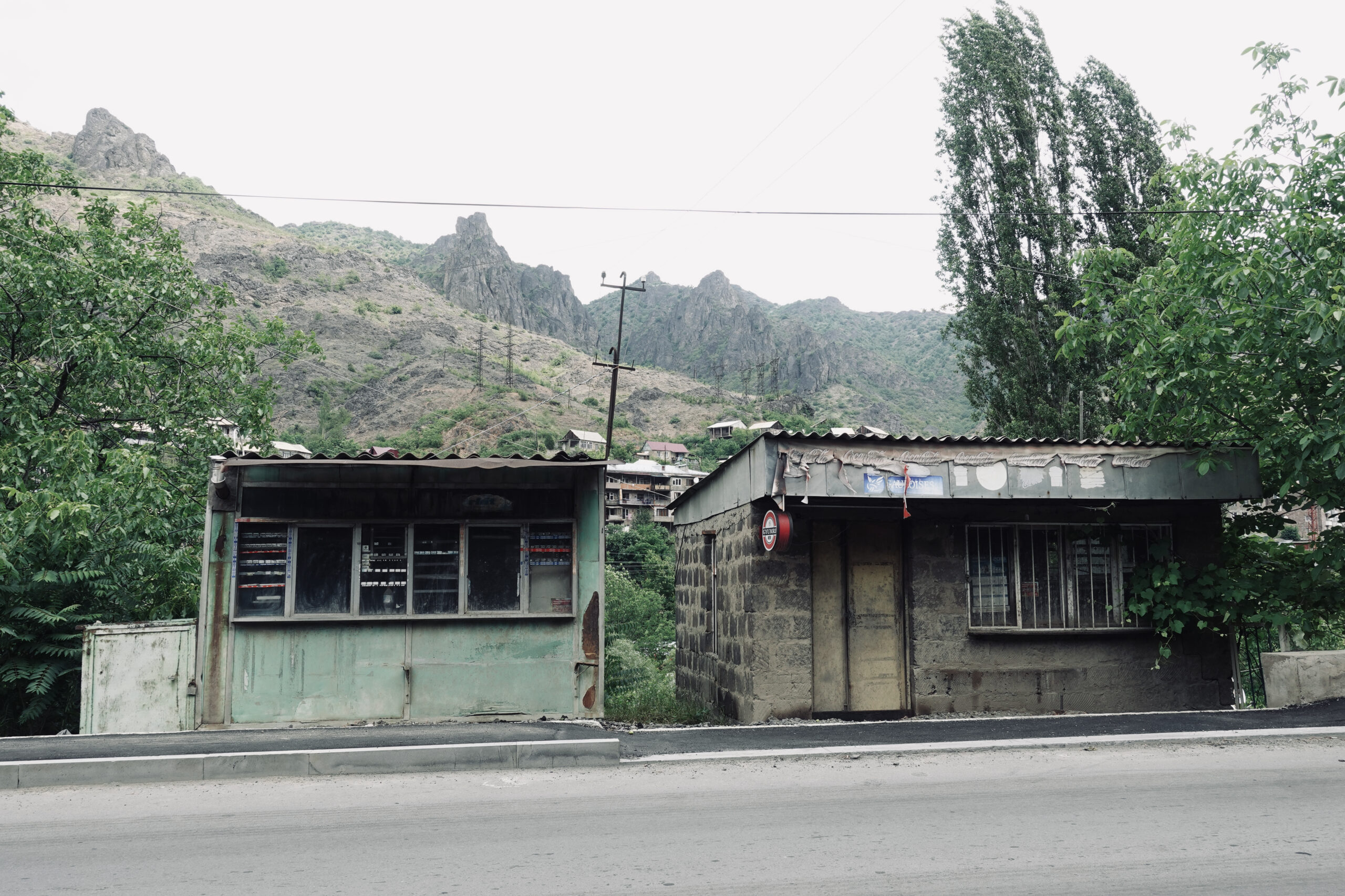 We pass various abandoned buildings