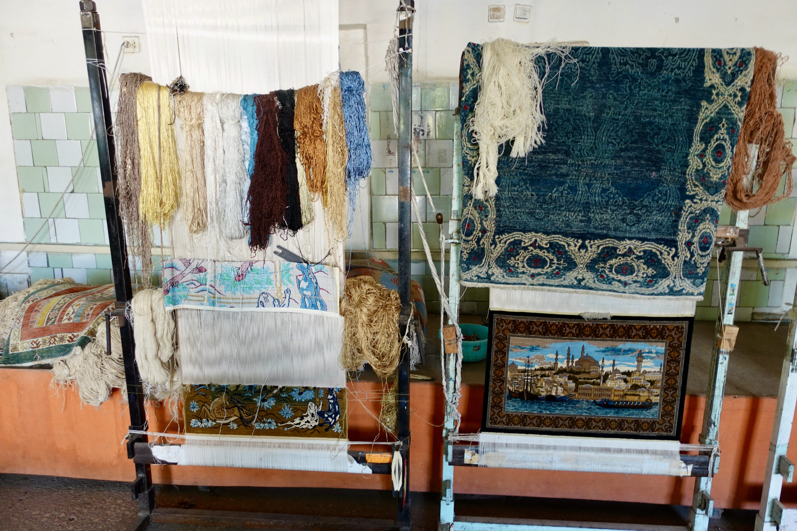 Elaborate silk carpets are also woven on site