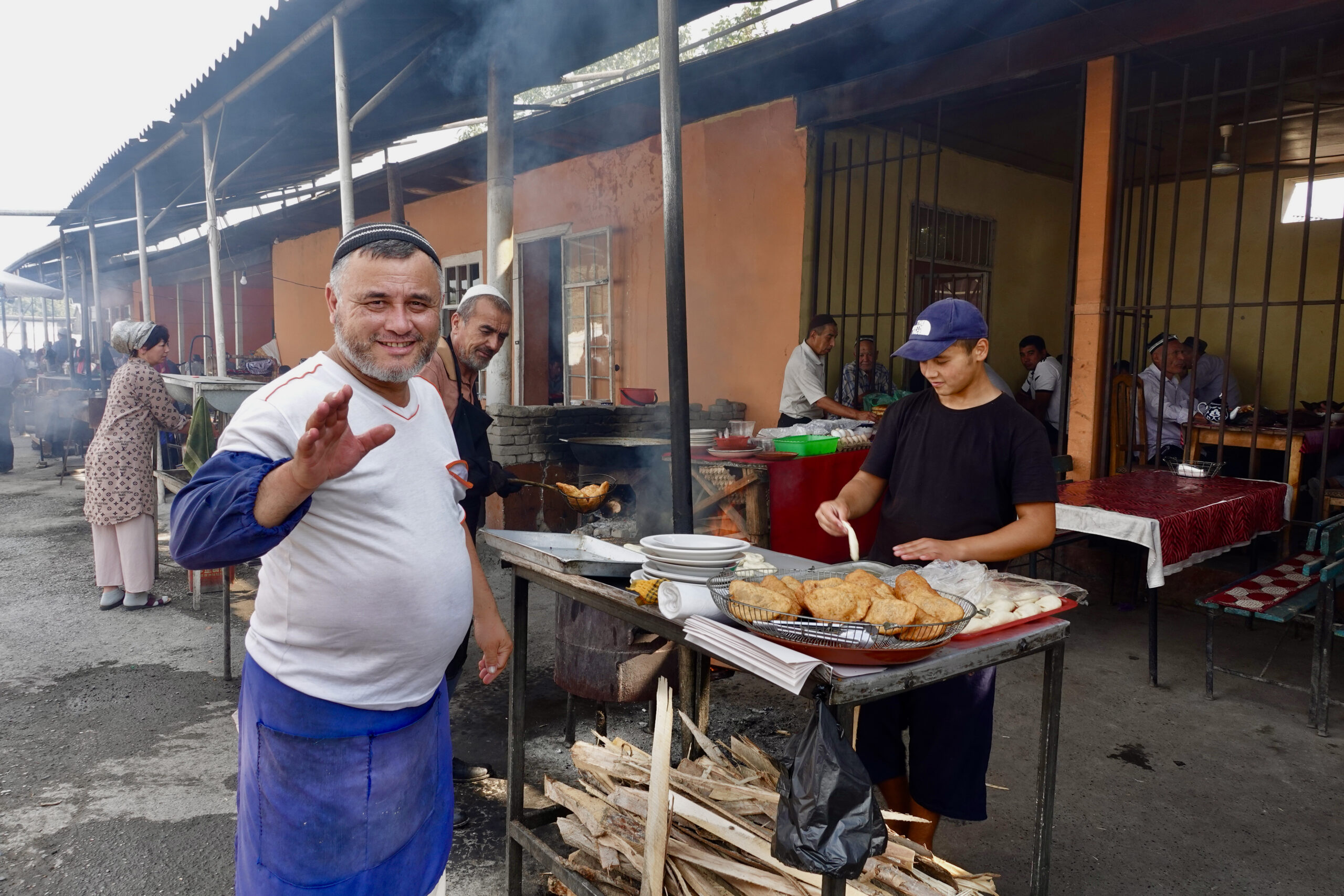 Numerous stalls provide visitors and market vendors with shashlik kebabs and filled dumplings