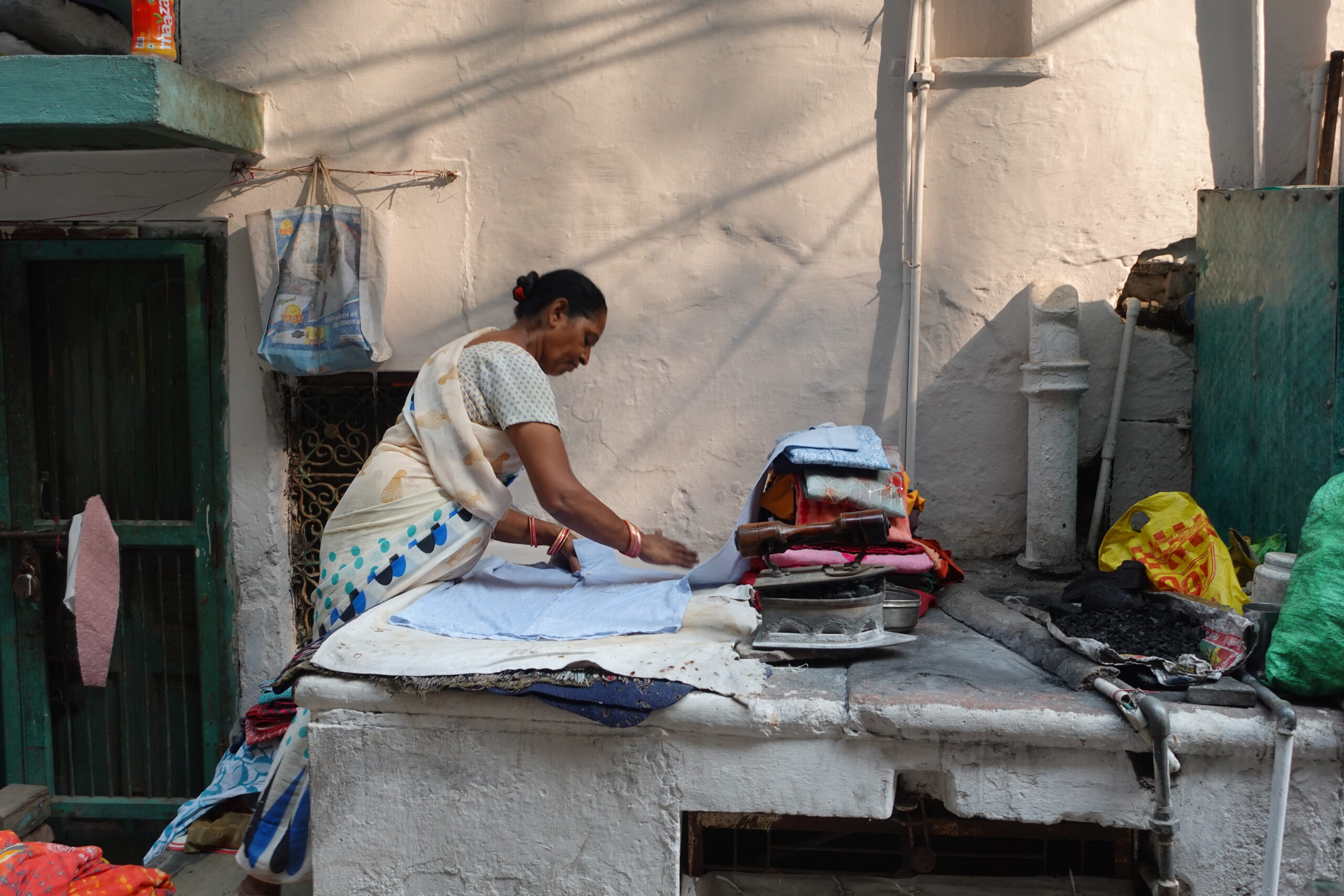 Here they still iron with charcoal