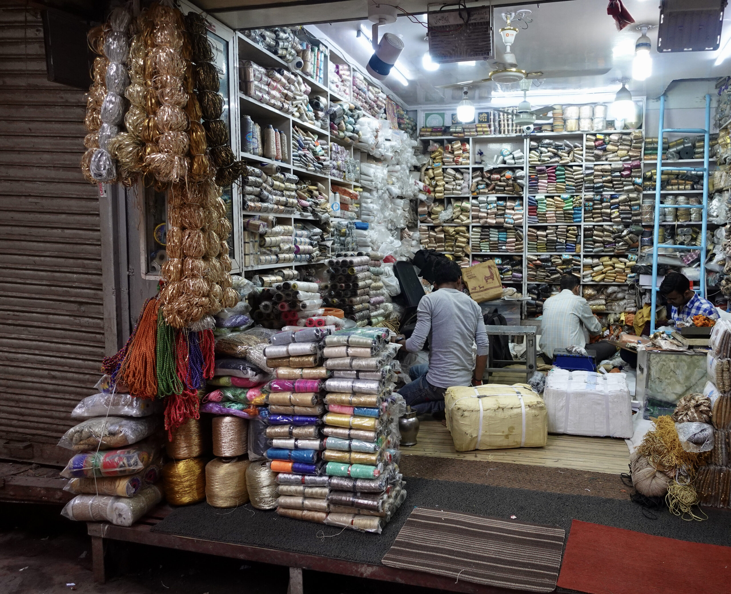 This alley sells accessories for festive saris