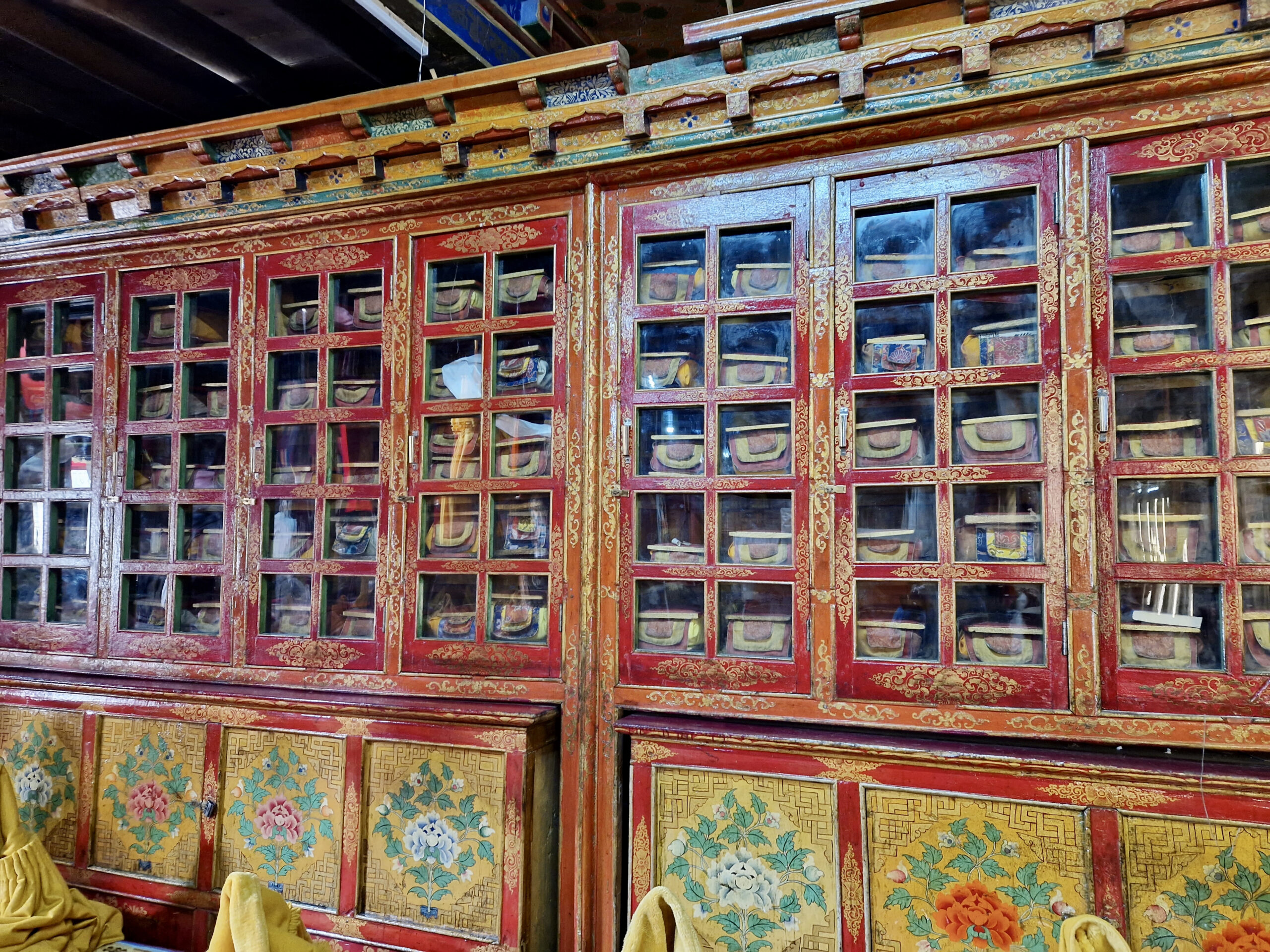 These containers hold 108 individual chapters of Buddhist teachings