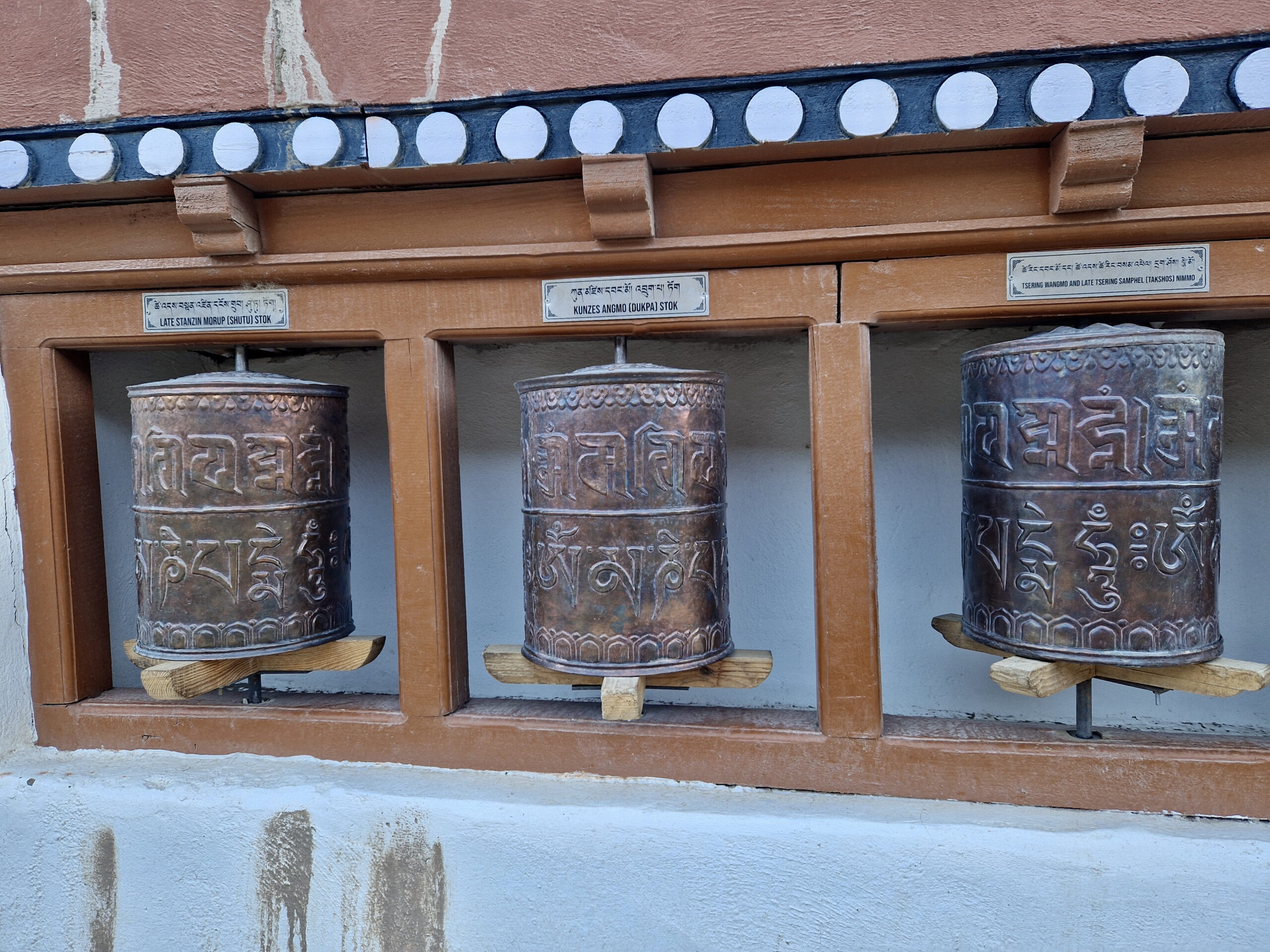 The prayer wheels contain paper rolls with mantras