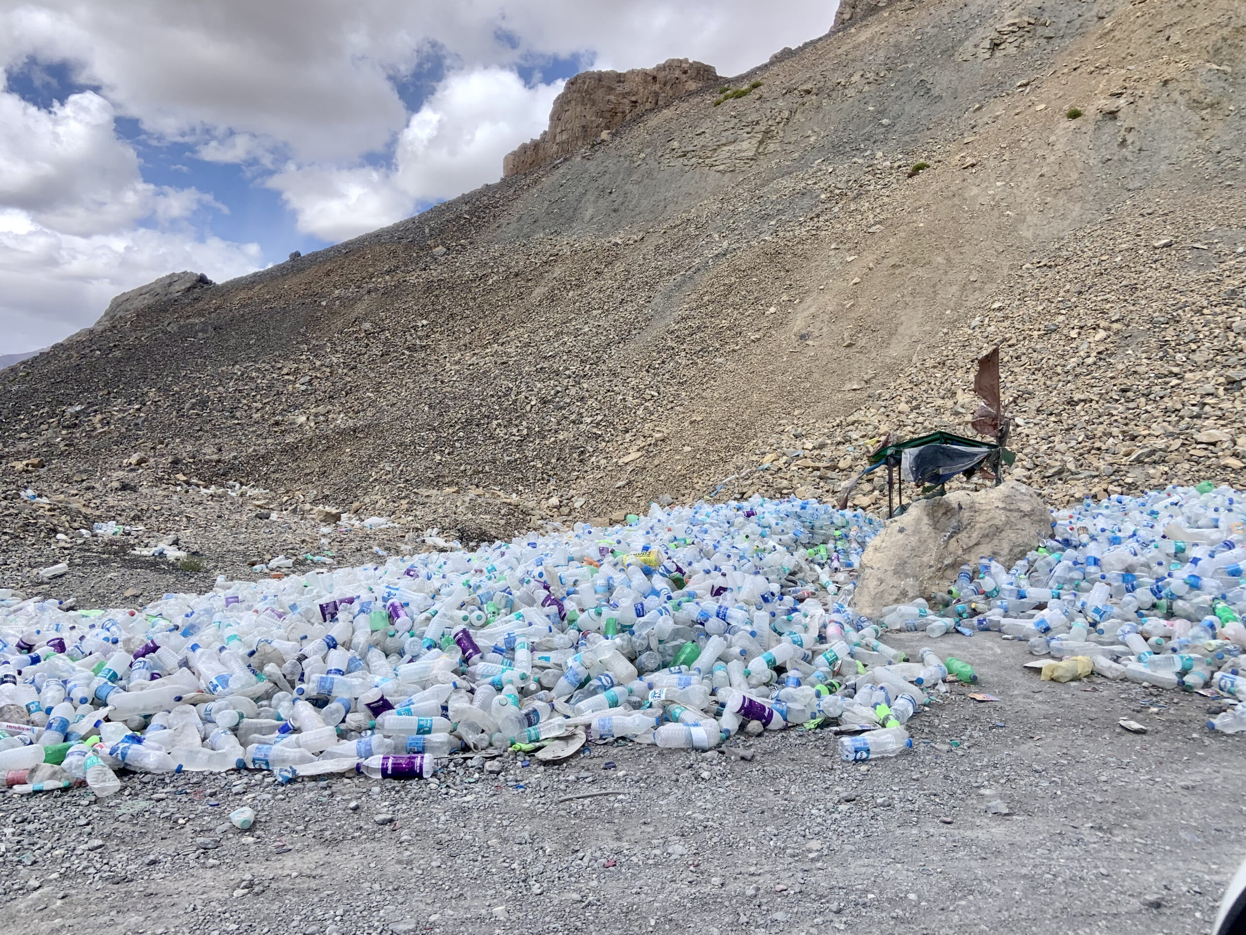 Not just garbage, but according to legend, the plastic bottles are supposed to soothe the spirit of the infamous Gata Loops...